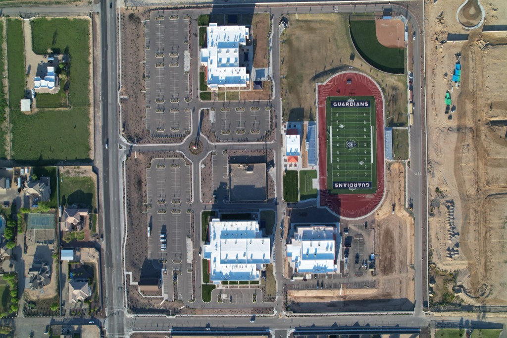 Aerial campus sitework used for pre-construction planning context