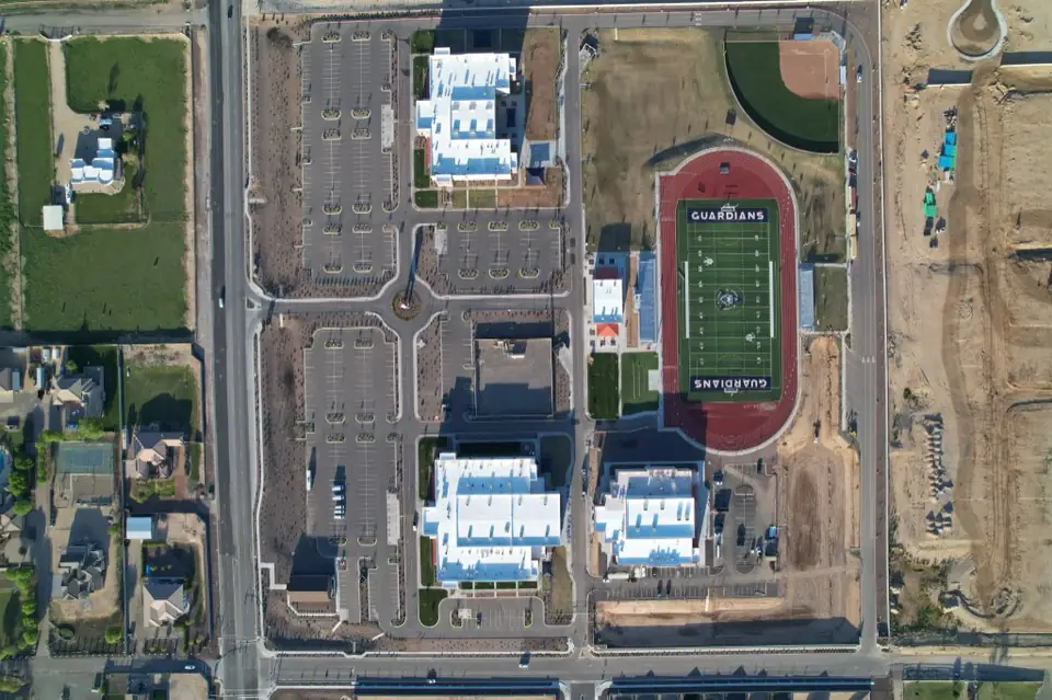 Aerial campus sitework used for pre-construction planning context